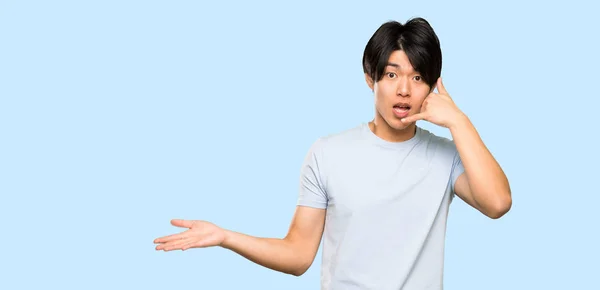 Ásia Homem Com Azul Camisa Fazendo Telefone Gesto Duvidar Sobre — Fotografia de Stock