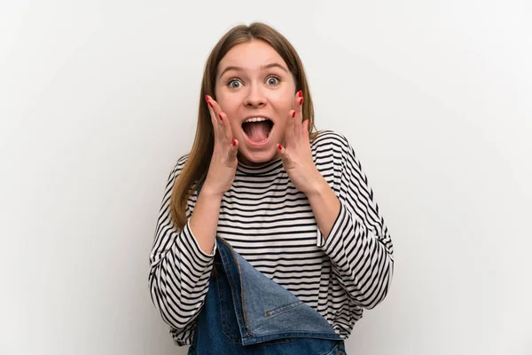 Young Woman Dungarees White Wall Surprise Facial Expression — Stock Photo, Image