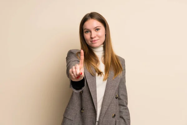 Junge Geschäftsfrau Zeigt Und Hebt Einen Finger — Stockfoto