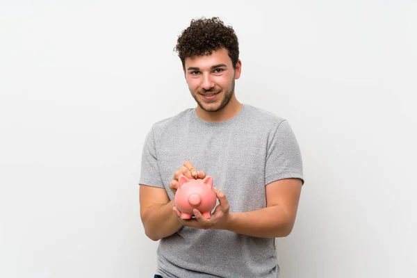 Man Med Lockigt Hår Över Isolerad Vägg Som Håller Stor — Stockfoto