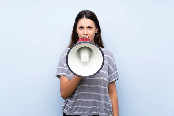 Young Brunette Woman Isolated Blue Background Shouting Megaphone — Stock Photo, Image