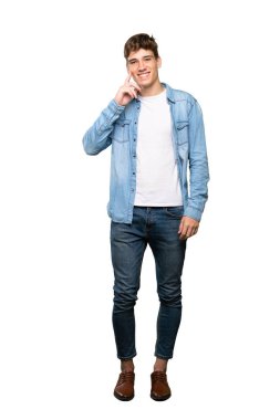 İzole beyaz arka plan üzerinde bakarken bir fikir düşünme yakışıklı bir genç adam tam uzunlukta bir çekim