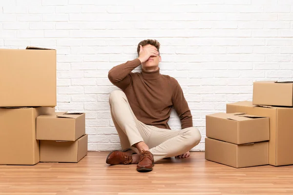 Handsome Young Man Moving New Home Boxes Covering Eyes Hands — Stock Photo, Image