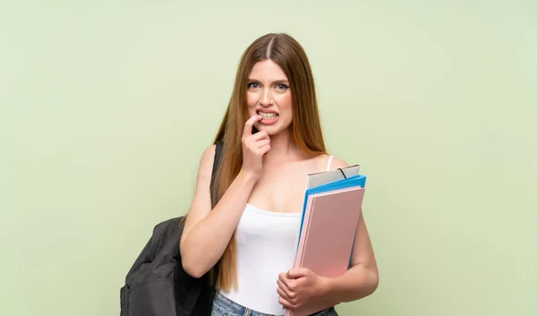 Young Student Woman Isolated Green Background Nervous Scared — Stock Photo, Image