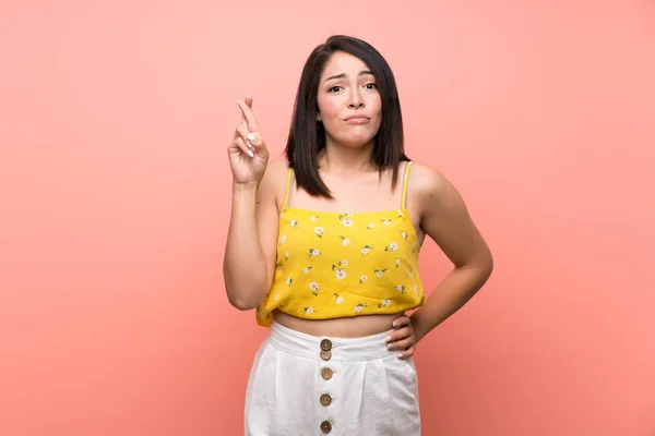 Young Mexican Woman Isolated Wall Fingers Crossing Wishing Best — Stock Photo, Image