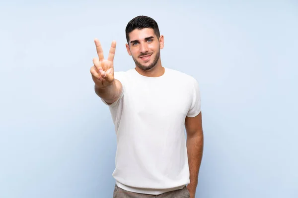 Caucásico Guapo Hombre Sobre Aislado Azul Fondo Sonriendo Mostrando Señal — Foto de Stock