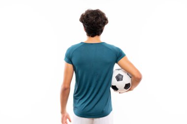 Izole beyaz duvar üzerinde genç futbolcu adam