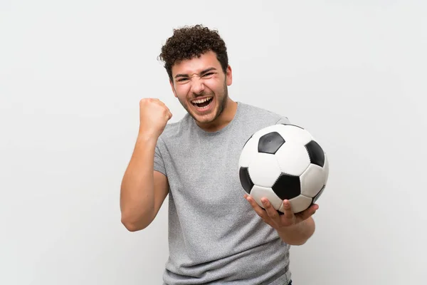 Uomo Con Capelli Ricci Sopra Parete Isolata Che Tiene Pallone — Foto Stock