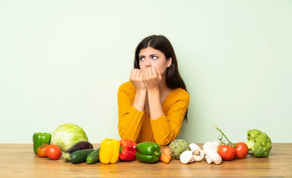 Teenager Girl Many Vegetables Nervous Scared Putting Hands Mouth — Stock Photo, Image