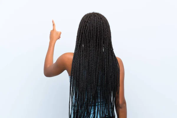 African American Teenager Girl Long Braided Hair Isolated Blue Background — Stock Photo, Image