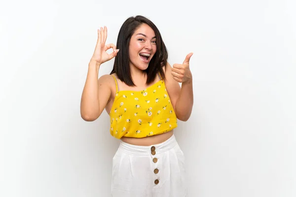 Young Mexican Woman Isolated Wall Showing Sign Thumb Gesture — Stock Photo, Image