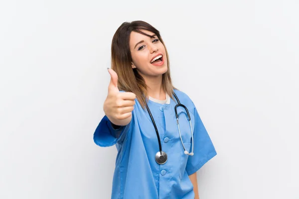 Jonge Verpleegster Vrouw Witte Muur Met Duimen Omhoog Omdat Iets — Stockfoto