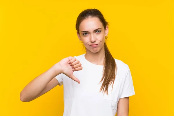 Young Woman Isolated Yellow Background Showing Thumb Sign — Stock Photo, Image