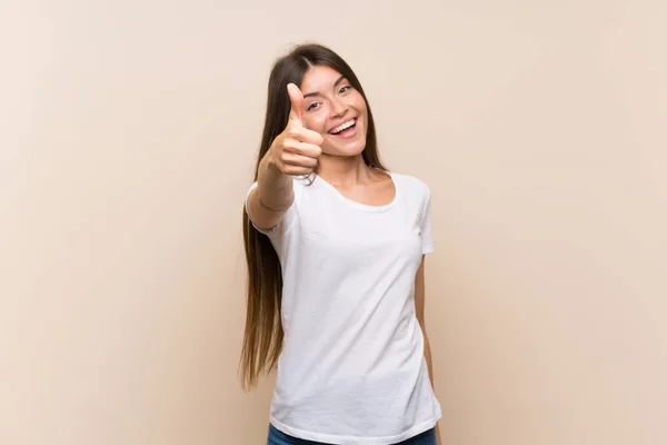 Menina Bonita Sobre Fundo Isolado Com Polegares Para Cima Porque — Fotografia de Stock