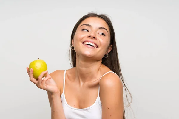 Mooie jonge vrouw met een appel — Stockfoto