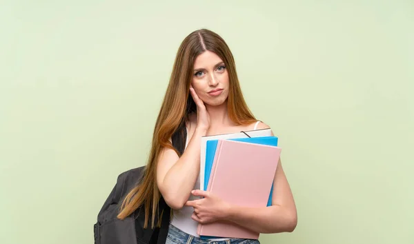 Jonge Student Vrouw Geïsoleerde Groene Achtergrond Ongelukkig Gefrustreerd — Stockfoto