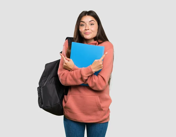 Joven Estudiante Con Cuadernos Apuntando Los Laterales Que Tienen Dudas —  Fotos de Stock