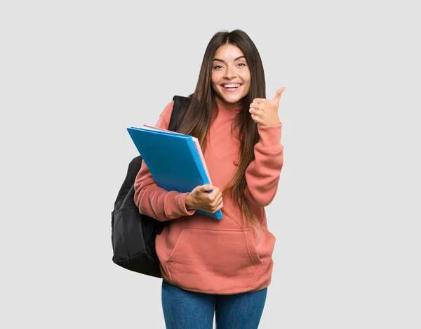 Ung Student Kvinna Håller Anteckningsböcker Som Visar Tecken Och Tummen — Stockfoto