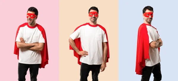 Set of Superhero man with mask and red cape posing with arms at