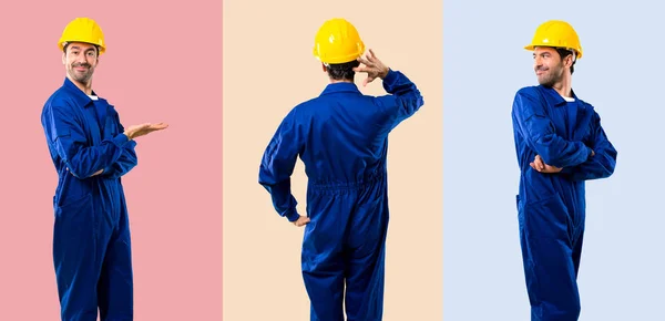 Satz junger Arbeiter mit Helm auf Rückenlehne und seitlich — Stockfoto