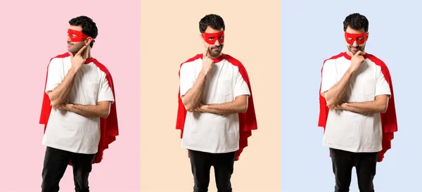 Set of Superhero man with mask and red cape standing and looking