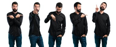 Sakallı yakışıklı bir adam seti d sahip laterals işaret