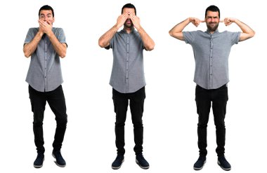 Yakışıklı adam seti elleri ile her iki kulak kapsayan, gözleri kaplayan