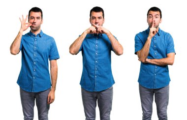 Kapanış mo bir işaret gösteren mavi gömlek ile Yakışıklı adam Seti