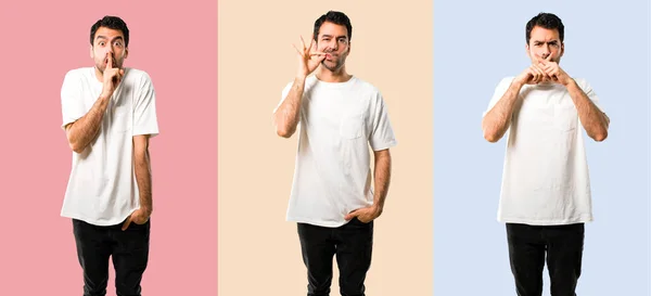 Conjunto de Joven con camisa blanca mostrando un signo de cierre de boquilla —  Fotos de Stock
