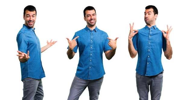 Conjunto de homem bonito com camisa azul orgulhoso e auto-satisfeito em — Fotografia de Stock