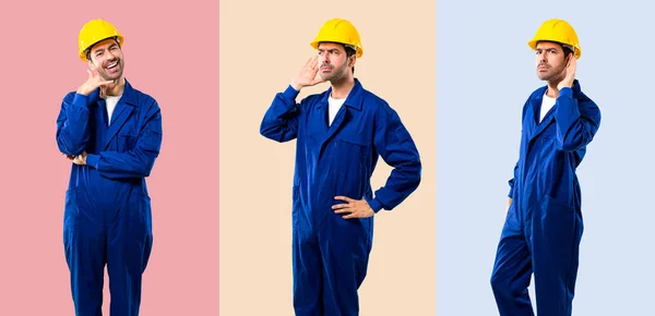 Set of Young workman with helmet listening to something on color — Stock Photo, Image