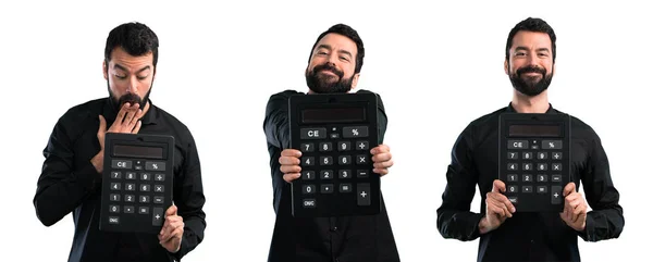 Conjunto de hombre guapo con barba sosteniendo una calculadora —  Fotos de Stock