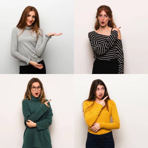Set of women over white background surprised and pointing side