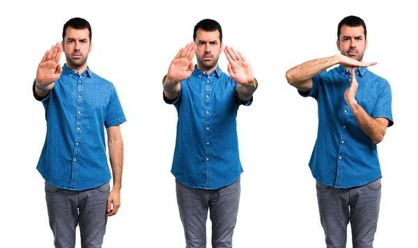 Set of Handsome man with blue shirt making stop gesture with her — Stock Photo, Image
