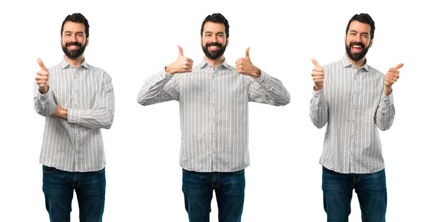 Collage de bel homme à la barbe donnant un pouce geste un — Photo