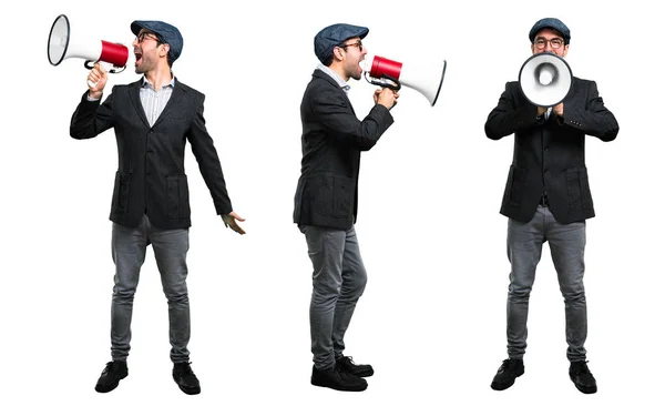 Set of Handsome modern man with beret and glasses holding a mega — Stock Photo, Image