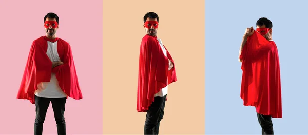 Set of Superhero man with mask and red cape with his arms crosse