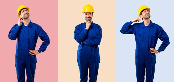 Conjunto de Obrero joven con casco sobre fondo colorido —  Fotos de Stock