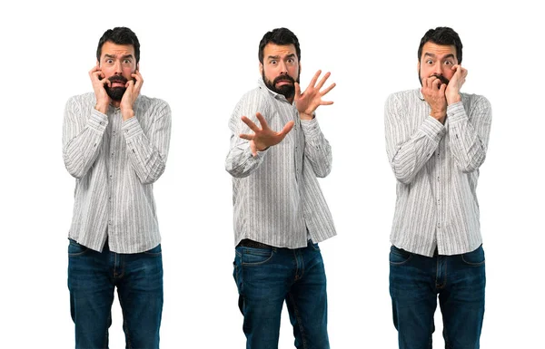 Colagem de homem bonito assustado com barba — Fotografia de Stock