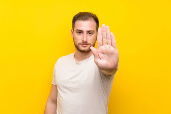Handsome Man Yellow Background Making Stop Gesture Her Hand — Stock Photo, Image