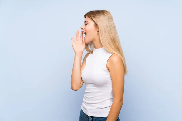 Adolescente Chica Sobre Aislado Azul Fondo Feliz Contando Cuatro Con — Foto de Stock