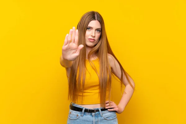 Young Woman Isolated Yellow Background Making Stop Gesture Her Hand — Stock Photo, Image