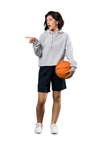 Full Length Shot Young Woman Playing Basketball Surprised Pointing Finger — Stock Photo, Image