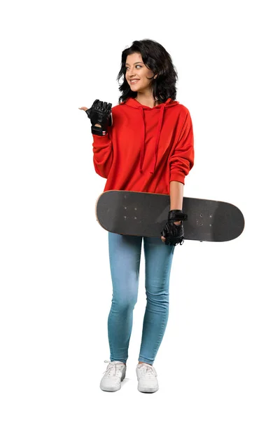 Full Length Shot Young Skater Woman Pointing Side Present Product — Stock Photo, Image