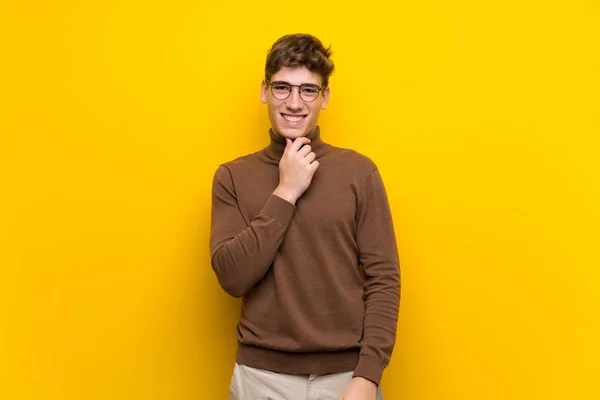 Handsome Young Man Isolated Yellow Background Glasses Smiling — Stock Photo, Image