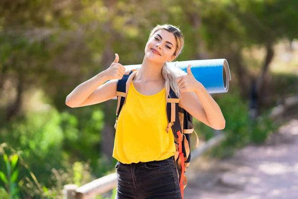 Teenager Girl Hiking Outdoors Thumbs Gesture Smiling — Stock Photo, Image