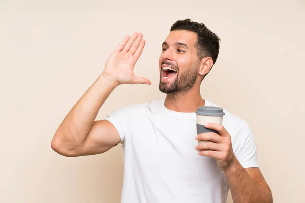 Jonge Man Met Baard Houden Van Een Take Away Koffie — Stockfoto