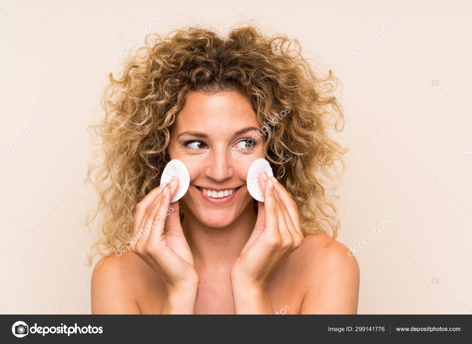Young Blonde Woman Curly Hair Removing Makeup Her Face Cotton