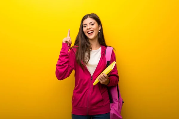 Nastolatek Uczeń Dziewczyna Żywe Żółte Tło Liczenia Numer Jeden Znak — Zdjęcie stockowe