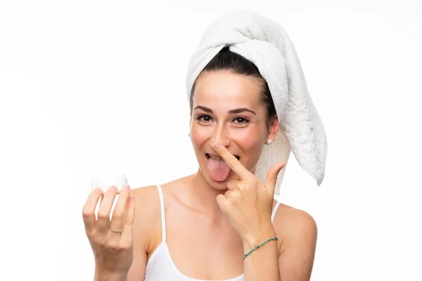 Junge Frau Mit Feuchtigkeitscreme Über Isoliertem Weißem Hintergrund — Stockfoto
